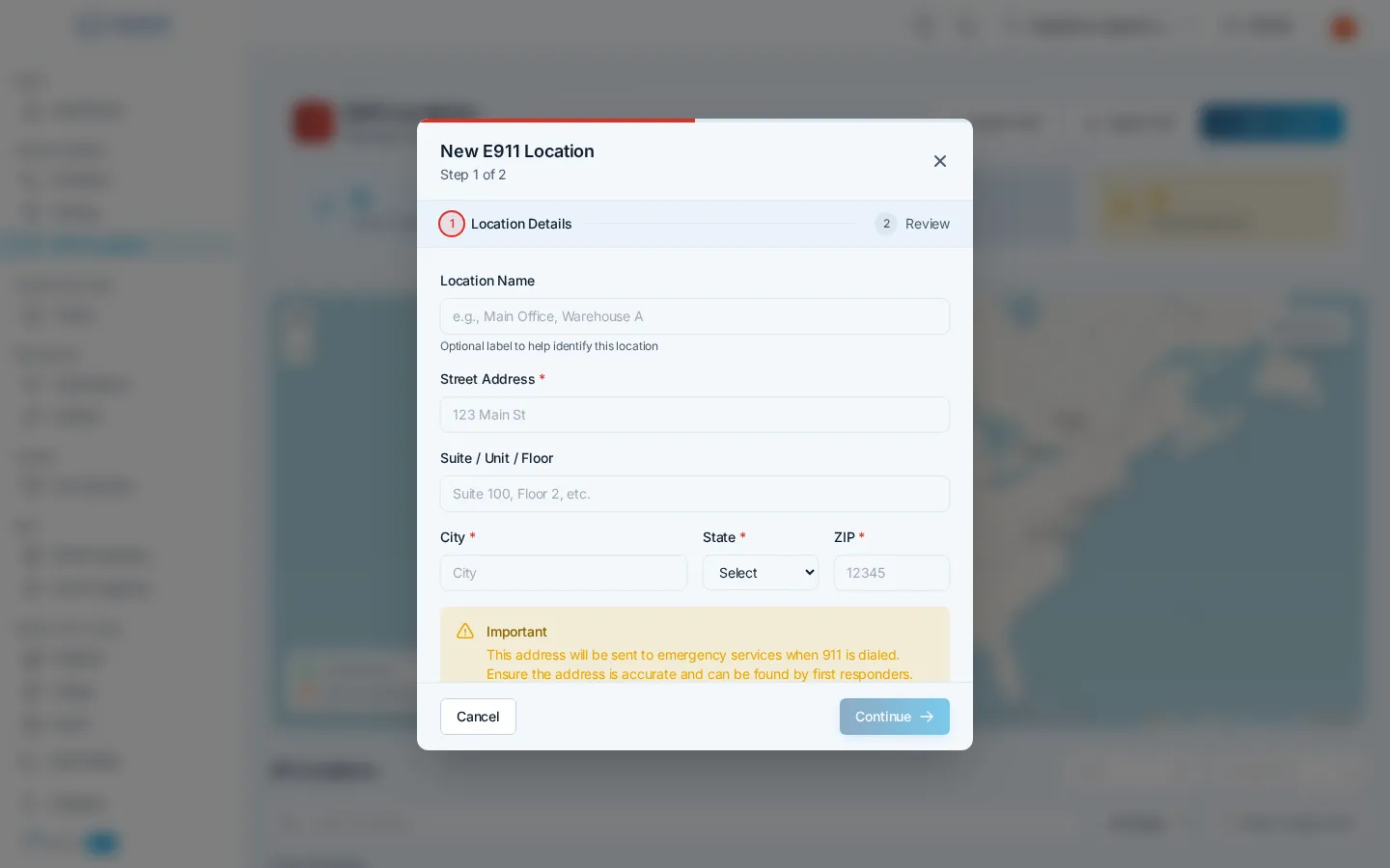 The New E911 Location dialog on its Location Details step, with fields for street address, suite, city, state, and ZIP and a warning that the address goes to emergency services