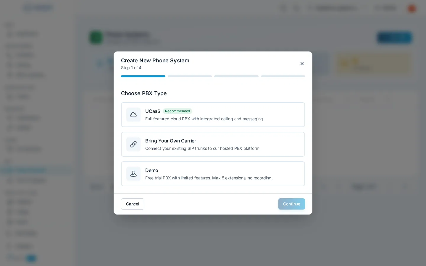 The Create New Phone System wizard on its Choose PBX Type step, offering UCaaS, Bring Your Own Carrier, and Demo options
