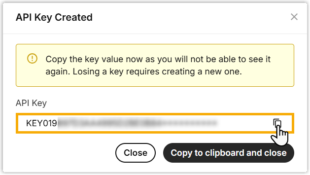 Telnyx dialog showing the generated API key with a copy control