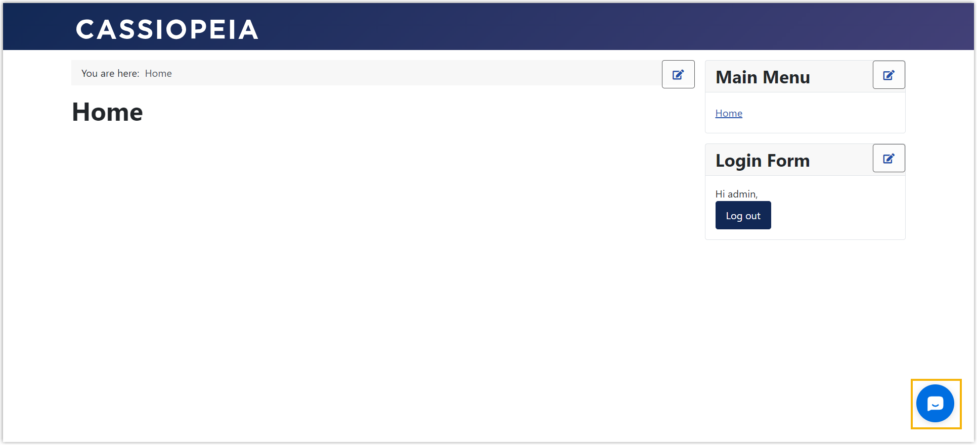 Joomla website showing the live chat widget in the lower-right corner